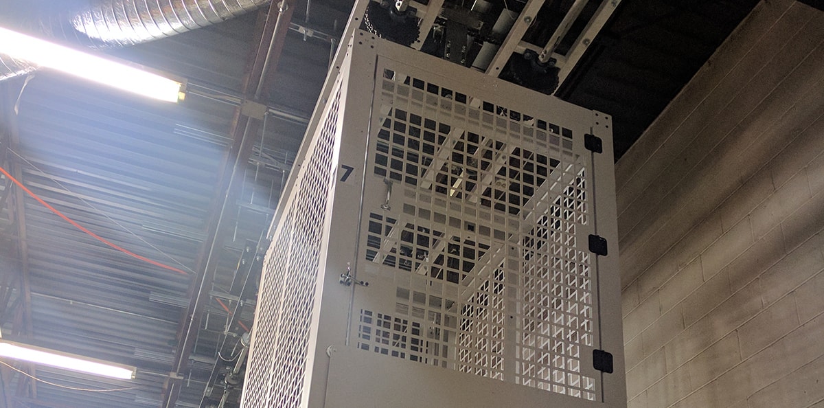 overhead security cage hanging from ceiling